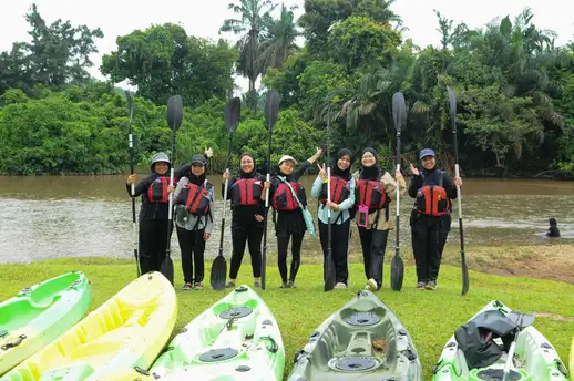 Trained guide supervising participants with safety equipment